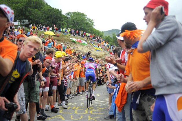 ALPE D'HUEZ, FRANCE - JULY 18: Przemys?aw Niemiec of Team Lampre-Merida makes his way through Dutch corner during stage eighteen of the 2013 Tour de France, a 172.5KM road stage from Gap to l'Alpe d'Huez, on July 18, 2013 in Alpe d'Huez, France. (Photo by Charlie Crowhurst/Getty Images)