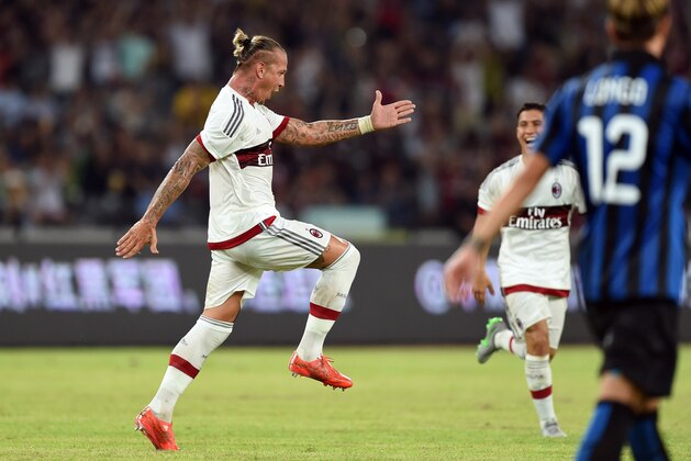 AC Milan's French defender Philippe Mexes (L) celebrates after scoring during the International Champions Cup football match between AC Milan and  Inter Milan in Shenzhen on July 25, 2015.  AFP PHOTO / JOHANNES EISELE        (Photo credit should read JOHANNES EISELE/AFP/Getty Images)