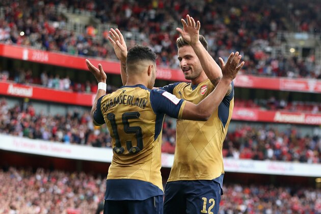 LONDON, ENGLAND - JULY 25:  Olivier Giroud (R) of Arsenal celebrates with team mate Alex Oxlade-Chamberlain after scoring the first goal during the Emirates Cup match between Arsenal and Olympique Lyonnais at the Emirates Stadium on July 25, 2015 in London, England.  (Photo by David Rogers/Getty Images)