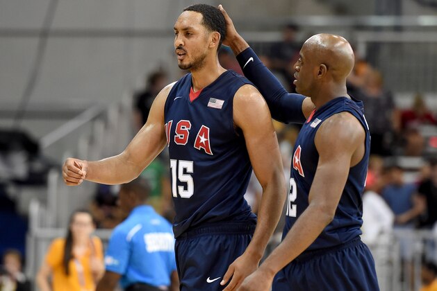 TORONTO, ON - JULY 25: Ryan Hollins #15 and Damien Wilkins #12 of the United States celebrate a 87-82 win over the Dominican Republic to take the bronze medal in men's basketball during the 2015 Pan Am Games at the Ryerson Athletic Centre on July 25, 2015 in Toronto, Canada. (Photo by Harry How/Getty Images) TORONTO, ON - JULY 25: Ryan Hollins #15 and Damien Wilkins #12 of the United States celebrate a 87-82 win over the Dominican Republic to take the bronze medal in men's basketball during the 2015 Pan Am Games at the Ryerson Athletic Centre on July 25, 2015 in Toronto, Canada. (Photo by Harry How/Getty Images)