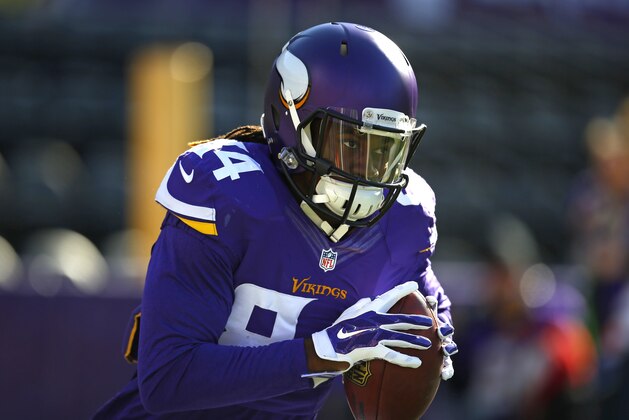 Minnesota Vikings wide receiver Cordarrelle Patterson (84) runs the ball during pregame before an NFL football game against the Washington Redskins, Sunday, Nov. 2, 2014, in Minneapolis. (Jeff Haynes/AP Images for Panini)