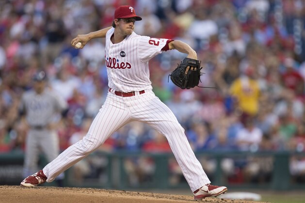 Philadelphia Phillies starting pitcher Aaron Nola throws a pitch during the third inning of a baseball game against the Tampa Bay Rays, Tuesday, July 21, 2015, in Philadelphia. The Rays won 1-0. (AP Photo/Chris Szagola)