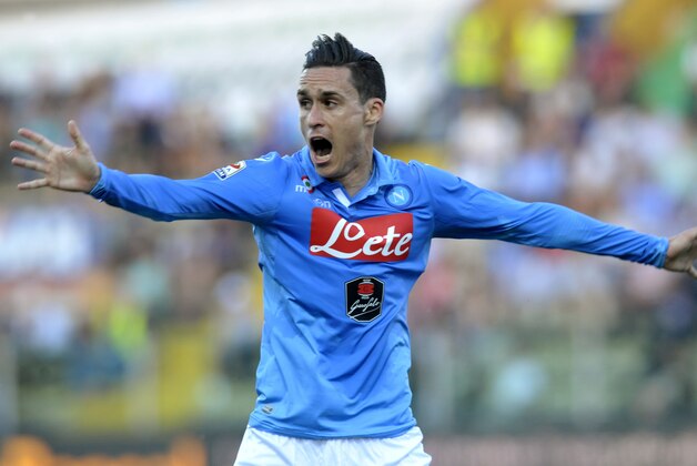 Napoli's Jose Callejon shouts as he opens his arms during a Serie A soccer match against Parma, at Parma's Tardini stadium, Italy, Sunday, May 10, 2015. (AP Photo/Marco Vasini)