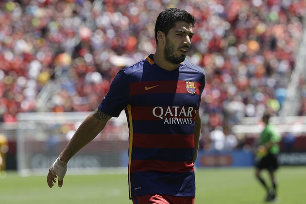 FC Barcelona's Luis Suarez walks off the field after the first half of an International Champions Cup soccer match against Manchester United in Santa Clara, Calif., Saturday, July 25, 2015. (AP Photo/Jeff Chiu)