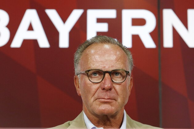 Bayern Munich CEO Karlheinz Rummenigge attends a news conference prior to a show training and team presentation for the upcoming German first division Bundesliga soccer season at the Allianz Arena in Munich, Germany, on Saturday, July 11, 2015. Bayern Munich chairman Karl-Heinz Rummenigge says Bastian Schweinsteiger is leaving the club for Manchester United. Rummenigge says
