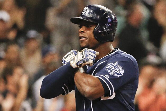 San Diego Padres' Justin Upton celebrates his two run homer against the Arizona Diamondbacks in the fifth inning of a baseball game Saturday, June 27, 2015, in San Diego.  (AP Photo/Lenny Ignelzi)