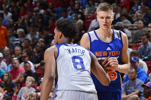 LAS VEGAS, NV - JULY 14: Jahlil Okafor #8 of the Philadelphia 76ers and Kristaps Porzingis #46 of the New York Knicks guard each other during the 2015 NBA Las Vegas Summer League game on July 14, 2015 at the Thomas & Mack Center in Las Vegas, Nevada. NOTE TO USER: User expressly acknowledges and agrees that, by downloading and or using this photograph, User is consenting to the terms and conditions of the Getty Images License Agreement. Mandatory Copyright Notice: Copyright 2015 NBAE  (Photo by David Dow/NBAE via Getty Images)