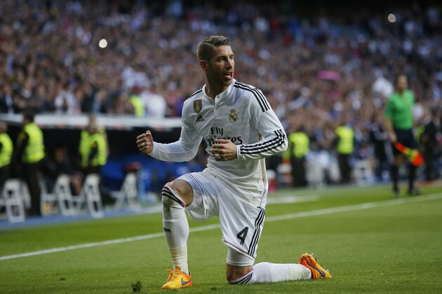 Real Madrid's Sergio Ramos celebrates his goal during a Spanish La Liga soccer match between Real Madrid and Malaga at the Santiago Bernabeu stadium in Madrid, Spain, Saturday, April 18, 2015. (AP Photo/Andres Kudacki)