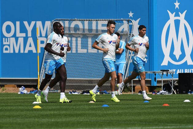 Olympique de Marseille's players take part in a training session in Marseille, southern France, on July 6, 2015, ahead of the 2015/2016 French Ligue 1 football season.  AFP PHOTO / ANNE-CHRISTINE POUJOULAT        (Photo credit should read ANNE-CHRISTINE POUJOULAT/AFP/Getty Images)
