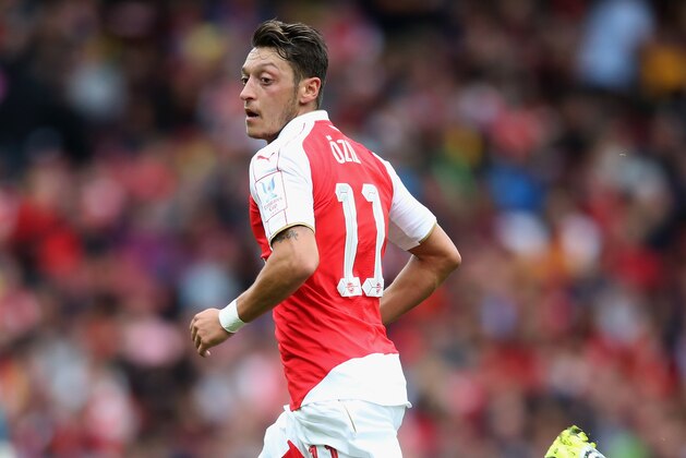 LONDON, ENGLAND - JULY 26:  Mesut Ozil of Arsenal looks on during the Emirates Cup match between Arsenal and VfL Wolfsburg at the Emirates Stadium on July 26, 2015 in London, England.  (Photo by David Rogers/Getty Images)