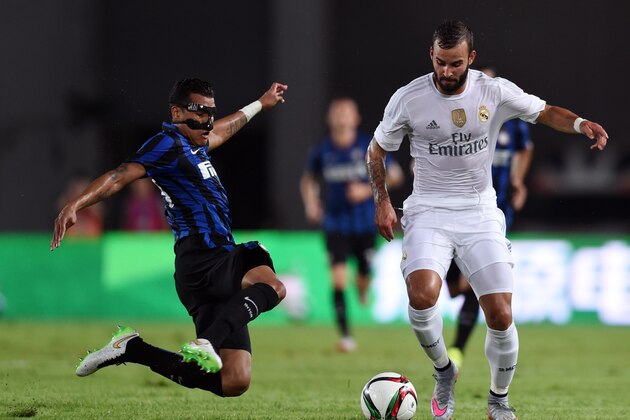 Real Madrid's Spanish midfielder Isco (R)  and Inter Milan's Colombian defender Jeison Murillo vie for the ball during the International Champions Cup football match between Inter Milan and Real Madrid in Guangzhou on July 27, 2015. AFP PHOTO / JOHANNES EISELE        (Photo credit should read JOHANNES EISELE/AFP/Getty Images)