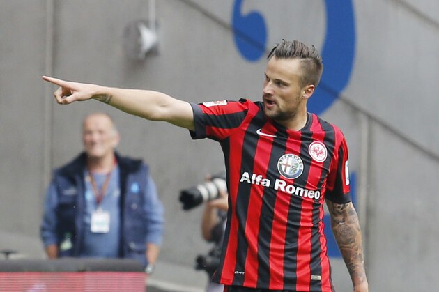 Frankfurt's Haris Seferovic from Switzerland celebrates his side's opening goal during a German first division Bundesliga soccer match between Eintracht Frankfurt and Bayer 04 Leverkusen in Frankfurt, Germany, Saturday, May 23, 2015. (AP Photo/Michael Probst)