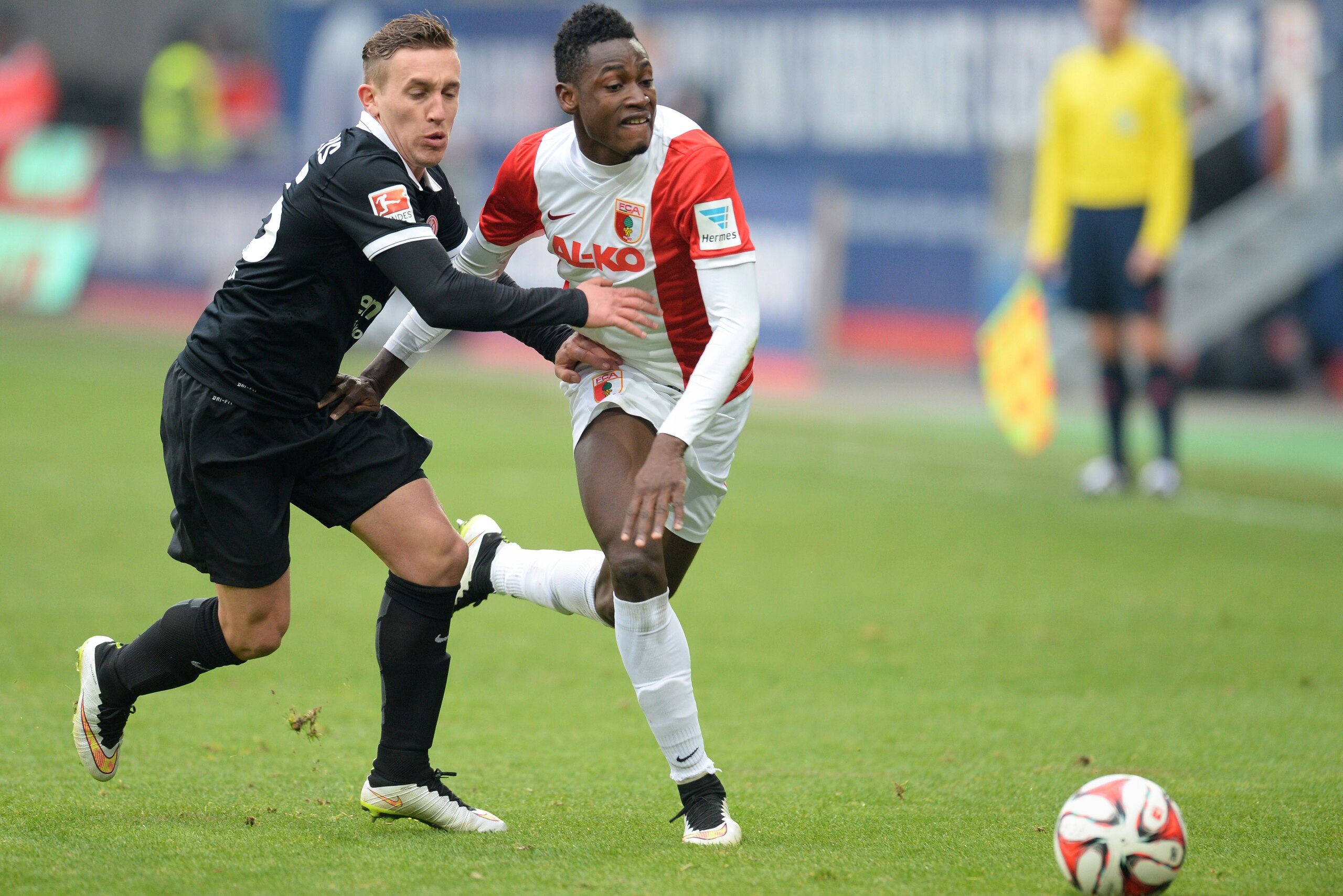 Augsburg's defender Abdul Rahman Baba (R) and Mainz's Argentinian midfielder Pablo de Blasis vie for the ball during the German first division Bundesliga football match FC Augsburg v Mainz 05 in Augsburg, southern Germany, on March 14, 2015. AFP PHOTO / CHRISTOF STACHE
DFL RULES TO LIMIT THE ONLINE USAGE DURING MATCH TIME TO 15 PICTURES PER MATCH. IMAGE SEQUENCES TO SIMULATE VIDEO IS NOT ALLOWED AT ANY TIME. FOR FURTHER QUERIES PLEASE CONTACT DFL DIRECTLY AT + 49 69 650050. (Photo credit should read CHRISTOF STACHE/AFP/Getty Images) Augsburg's defender Abdul Rahman Baba (R) and Mainz's Argentinian midfielder Pablo de Blasis vie for the ball during the German first division Bundesliga football match FC Augsburg v Mainz 05 in Augsburg, southern Germany, on March 14, 2015. AFP PHOTO / CHRISTOF STACHE
DFL RULES TO LIMIT THE ONLINE USAGE DURING MATCH TIME TO 15 PICTURES PER MATCH. IMAGE SEQUENCES TO SIMULATE VIDEO IS NOT ALLOWED AT ANY TIME. FOR FURTHER QUERIES PLEASE CONTACT DFL DIRECTLY AT + 49 69 650050. (Photo credit should read CHRISTOF STACHE/AFP/Getty Images)