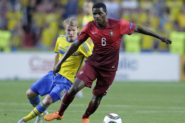 Portugal’s William Carvalho, left, and Sweden’s Oscar Lewicki challenge for the ball during the Euro U21 soccer championship final match between Sweden and Portugal, at the Eden stadium in Prague, Czech Republic, Tuesday, June 30, 2015. (AP Photo/Petr David Josek)