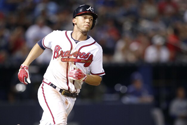 Jul 20, 2015; Atlanta, GA, USA; Atlanta Braves shortstop Andrelton Simmons (19) rounds first on a single against the Los Angeles Dodgers in the sixth inning at Turner Field. Mandatory Credit: Brett Davis-USA TODAY Sports Jul 20, 2015; Atlanta, GA, USA; Atlanta Braves shortstop Andrelton Simmons (19) rounds first on a single against the Los Angeles Dodgers in the sixth inning at Turner Field. Mandatory Credit: Brett Davis-USA TODAY Sports