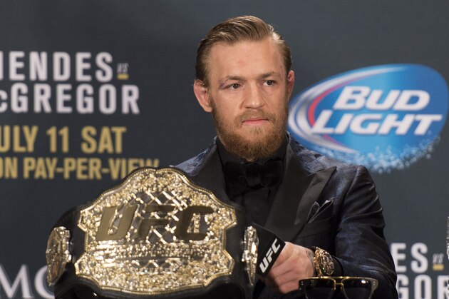 LAS VEGAS, NV - JULY 11:  UFC interim featherweight champion Conor McGregor interacts with the media during the UFC 189 post fight press conference at the MGM Grand Garden Arena on July 11, 2015 in Las Vegas, Nevada. (Photo by Jeff Bottari/Zuffa LLC/Zuffa LLC via Getty Images)
