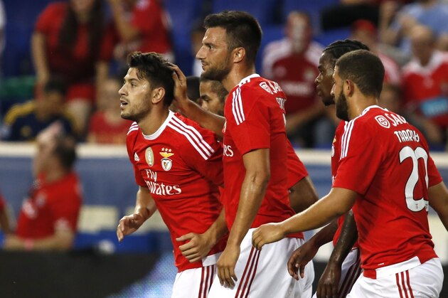 Benfica's Pizzi (L) celebrates after scoring a goal against Red Bulls during the International Champions Cup football match between SL Benfica and Red Bulls at the Red Bull Arena on July 26, 2015 in Harrison, New Jersey. AFP PHOTO/KENA BETANCUR        (Photo credit should read KENA BETANCUR/AFP/Getty Images)