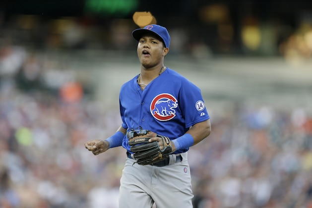 Chicago Cubs shortstop Starlin Castro runs to the dugout during the third inning of a baseball game against the Detroit Tigers, Wednesday, June 10, 2015, in Detroit. (AP Photo/Carlos Osorio)