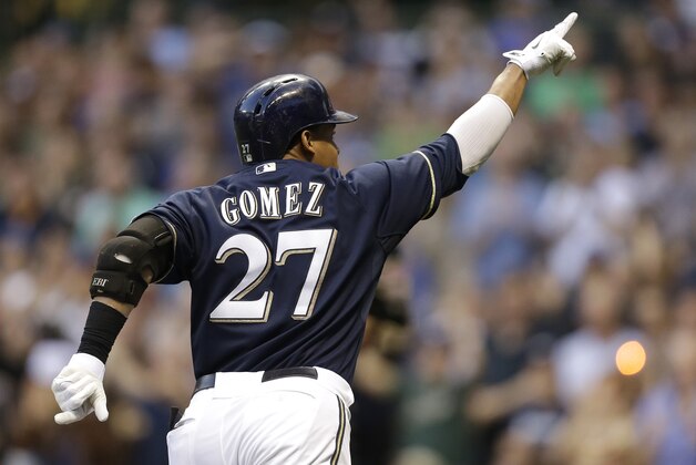 MILWAUKEE, WI - AUGUST 05: Carlos Gomez #27 of the Milwaukee Brewers runs the bases after hitting a two run homer in the bottom of the third inning against the San Francisco Giants at Miller Park on August 05, 2014 in Milwaukee, Wisconsin. (Photo by Mike McGinnis/Getty Images)