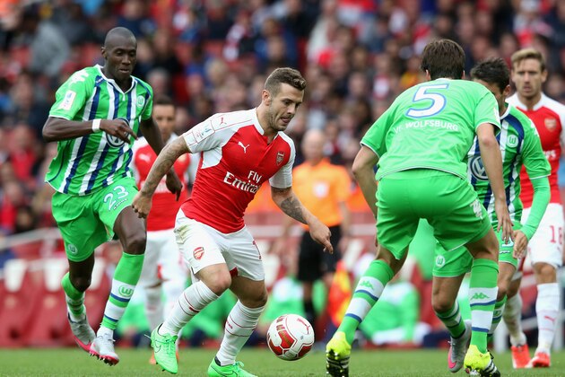 LONDON, ENGLAND - JULY 26: Jack Wilshere of Arsenal runs with the ball during the Emirates Cup match between Arsenal and VfL Wolfsburg at the Emirates Stadium on July 26, 2015 in London, England.  (Photo by David Rogers/Getty Images)