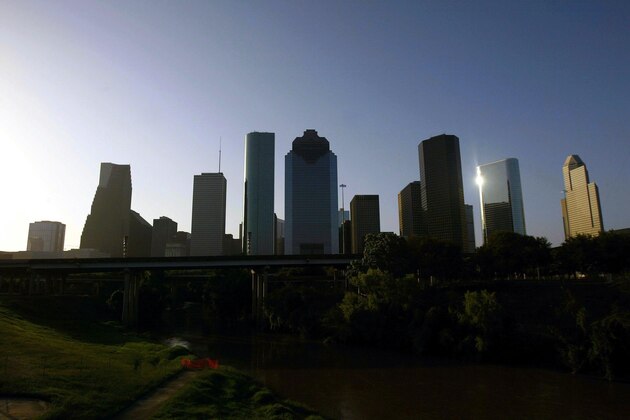 HOUSTON - JULY 4:  A general view of the Houston skyline on July 4, 2004 in Houston, Texas.  Houston will host the MLBAll-Star game on July 13, 2004.  (Photo by Ronald Martinez/Getty Images)