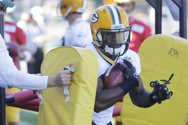 Green Bay Packers' Ty Montgomery runs a drill during an NFL football mini camp Tuesday, June 16, 2015, in Green Bay, Wis. (AP Photo/Morry Gash)
