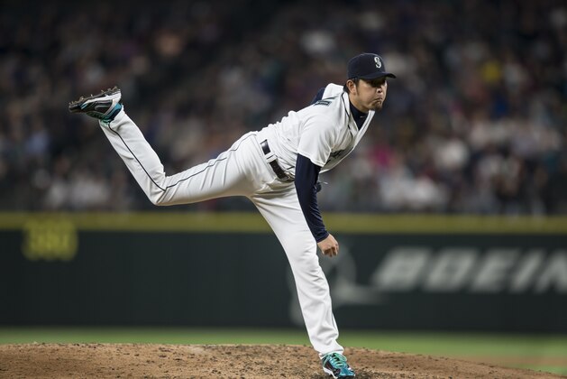 Seattle Mariners starter Hisashi Iwakuma delivers a pitch during a baseball game, against the Los Angeles Angels, Saturday, July 11, 2015, in Seattle. The Mariners won the game 5-0. (AP Photo/Stephen Brashear) Seattle Mariners starter Hisashi Iwakuma delivers a pitch during a baseball game, against the Los Angeles Angels, Saturday, July 11, 2015, in Seattle. The Mariners won the game 5-0. (AP Photo/Stephen Brashear)