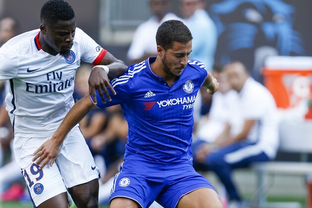 IMAGE DISTRIBUTED FOR INTERNATIONAL CHAMPIONS CUP - Paris Saint-Germain's Serge Aurier, left, battles Chelsea's Eden Hazard in the first half of an International Champions Cup Soccer match on Saturday, July 25, 2015, in Charlotte, N.C. (Brian Westerholt/AP Images for International Champions Cup)