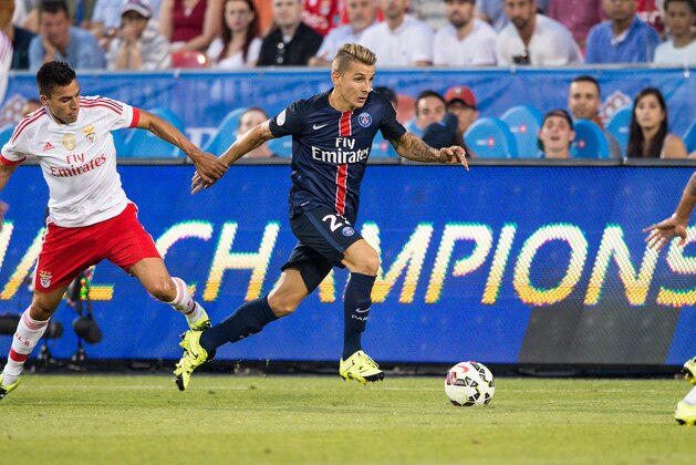 IMAGE DISTRIBUTED FOR INTERNATIONAL CHAMPIONS CUP - Lucas Digne (21) advances the ball during a game between SL Benfica and Paris Saint-Germain, on Saturday, July, 18, 2015 in Toronto, ON. Paris Saint-Germain defeated SL Benfica 3-2.  (Mike Janes/AP Images for International Champions Cup)