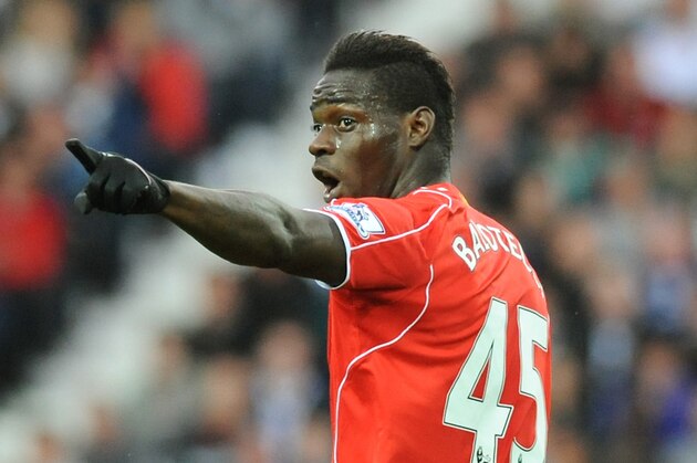 Liverpool's Mario Balotelli points during the English Premier League soccer match between West Bromwich Albion and Liverpool at the Hawthorns, West Bromwich, England, Saturday, April 25, 2015. (AP Photo/Rui Vieira)