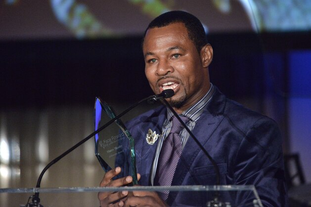 Shane Mosley speaks on stage at the 5th Annual Face Forward Gala held at the the Millennium Biltmore Hotel on Saturday, Sept.13, 2014, in Los Angeles. (Photo by Richard Shotwell/Invision/AP)