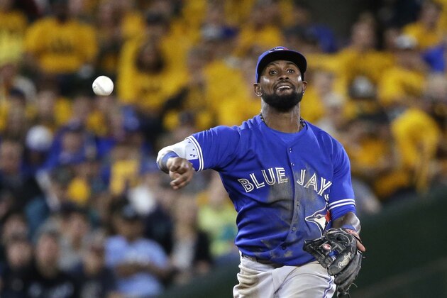 Toronto Blue Jays shortstop Jose Reyes in action against the Seattle Mariners in a baseball game Friday, July 24, 2015, in Seattle. (AP Photo/Elaine Thompson)