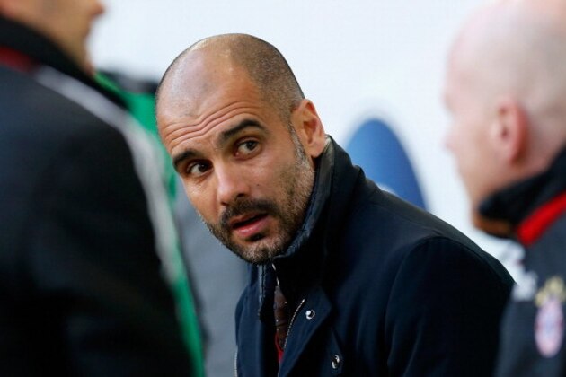 WOLFSBURG, GERMANY - MARCH 08:  Head coach Josep Guardiola of Munich reacts during the half time of the Bundesliga match between VfL Wolfsburg and FC Bayern Muenchen at Volkswagen Arena on March 8, 2014 in Wolfsburg, Germany.  (Photo by Boris Streubel/Getty Images)