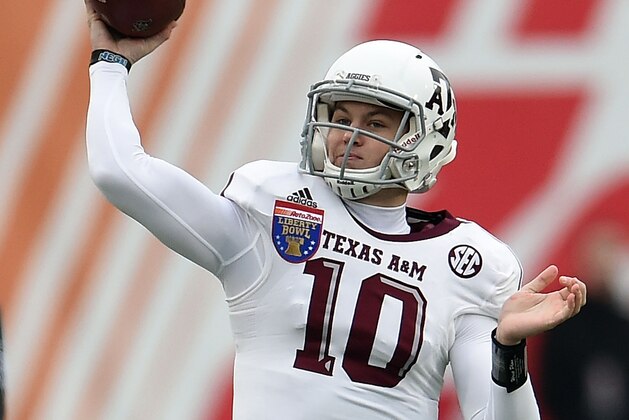 MEMPHIS, TN - DECEMBER 29:  Kyle Allen #10 of the Texas A&M Aggies participates in warmups prior to the 56th annual Autozone Liberty Bowl against the West Virginia Mountaineers at Liberty Bowl Memorial Stadium on December 29, 2014 in Memphis, Tennessee.  Texas A&M won the game 45-37.  (Photo by Stacy Revere/Getty Images)