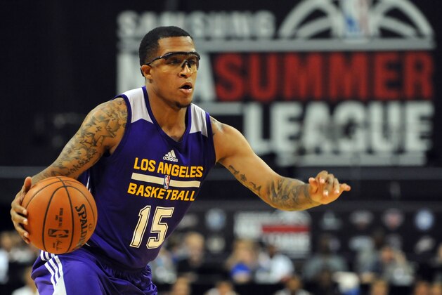 Jul 13, 2015; Las Vegas, NV, USA; Los Angeles Lakers guard Jabari Brown (15) dribbles the ball during an NBA Summer League game against the Knicks at Thomas & Mack Center. Mandatory Credit: Stephen R. Sylvanie-USA TODAY Sports
