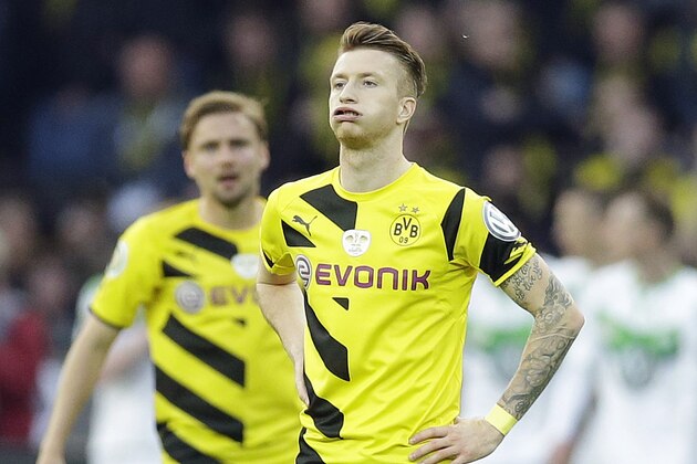 Dortmund's Marco Reus grimaces during the German soccer cup final match between Borussia Dortmund and VfL Wolfsburg in Berlin, Germany, Saturday, May 30, 2015. (AP Photo/Michael Sohn)