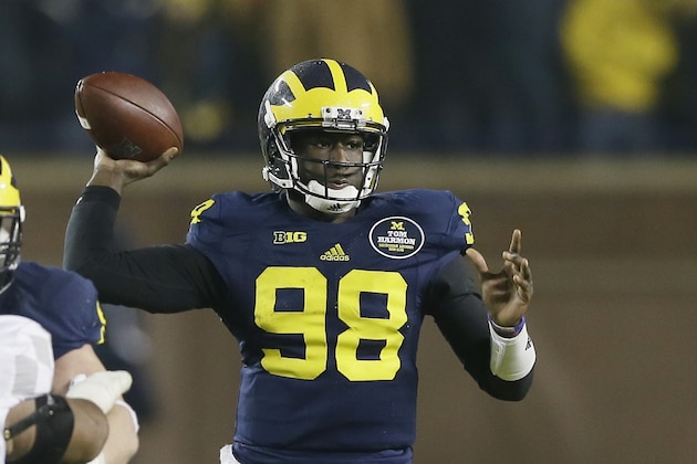 Michigan quarterback Devin Gardner passes during the second half of an NCAA college football game against Maryland in Ann Arbor, Mich., Saturday, Nov. 22, 2014. (AP Photo/Carlos Osorio)