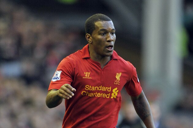 Liverpool's Andre Wisdom during their Premier League soccer match against Wigan Athletic at Anfield in Liverpool, England, Saturday Nov. 17, 2012. (AP Photo/Clint Hughes)