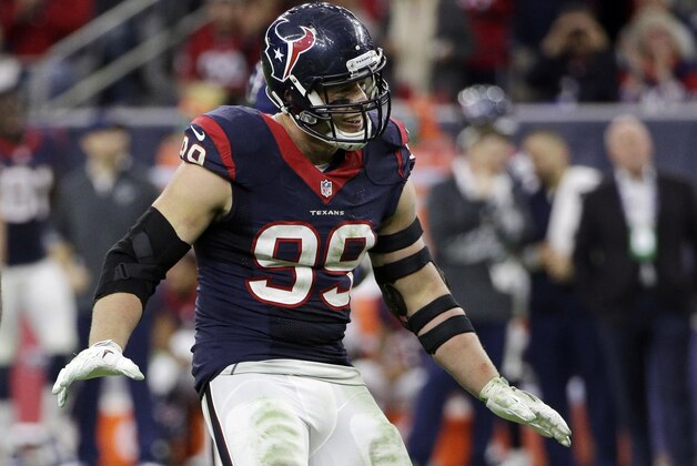 Houston Texans defensive end J.J. Watt (99) dances at a break between plays against the Jacksonville Jaguars during the second half of an NFL football game Sunday, Dec. 28, 2014, in Houston. (AP Photo/David J. Phillip)