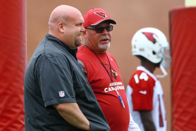 Jun 9, 2015; Tempe, AZ, USA; Arizona Cardinals head coach Bruce Arians (right) and general manager Steve Keim during minicamp practice at the Cardinals Training Facility. Mandatory Credit: Mark J. Rebilas-USA TODAY Sports