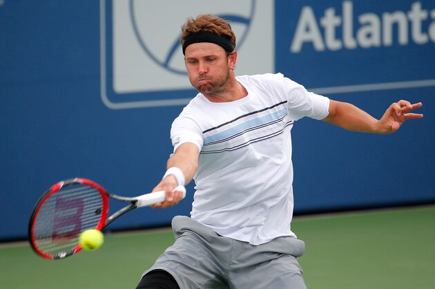 ATLANTA, GA - JULY 28:  Mardy Fish returns a forehand to Dudi Sela of Israel during the BB&T Atlanta Open at Atlantic Station on July 28, 2015 in Atlanta, Georgia.  (Photo by Kevin C. Cox/Getty Images)