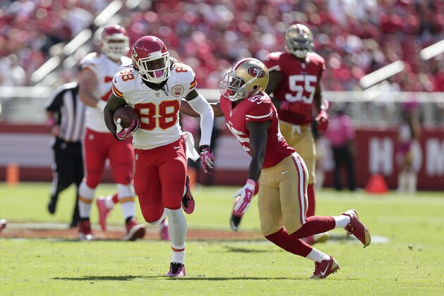 Kansas City Chiefs wide receiver Junior Hemingway (88) runs from San Francisco 49ers strong safety Jimmie Ward (25) during the first half of an NFL football game in Santa Clara, Calif., Sunday, Oct. 5, 2014. (AP Photo/Marcio Jose Sanchez)