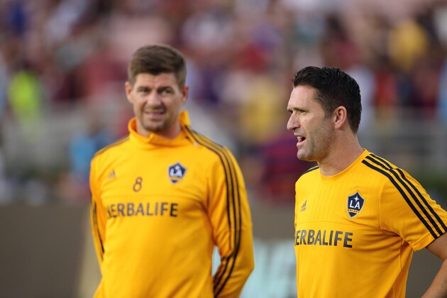 PASADENA, UNITED STATES - JULY 21:  Steven Gerrard and Robbie Keane of LA Galaxy warm up together before the International Champions Cup 2015 match between FC Barcelona and Los Angeles Galaxy at Rose Bowl on July 21, 2015 in Pasadena, California.  (Photo by Matthew Ashton - AMA/Getty Images)