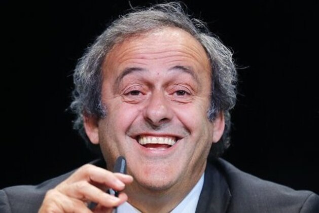 CORRECTS FIRST NAME   President of UEFA Michel Platini laughs during a press conference following a meeting of the UEFA board ahead of the FIFA congress in a hotel in Zurich, Switzerland, Thursday, May 28, 2015. The FIFA congress with the president's election is scheduled for Friday in Zurich.(AP Photo/Michael Probst)