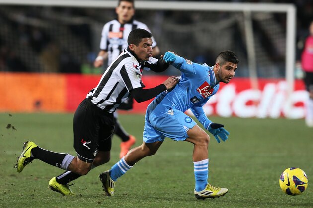Napoli's Lorenzo Insigne, right, and Udinese's Allan, fight for the ball during the Serie A soccer match between Udinese and Napoli, at the Friuli Stadium in Udine, Italy, Monday, Feb. 25, 2013. (AP Photo/Paolo Giovannini)