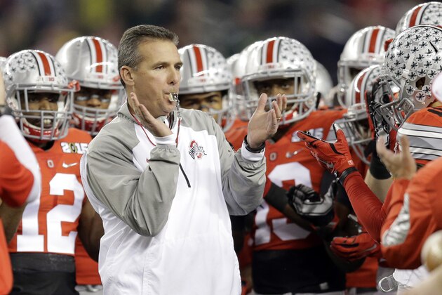 Ohio State head coach Urban Meyer rallies his team before the NCAA college football playoff championship game against Oregon Monday, Jan. 12, 2015, in Arlington, Texas. (AP Photo/Eric Gay)