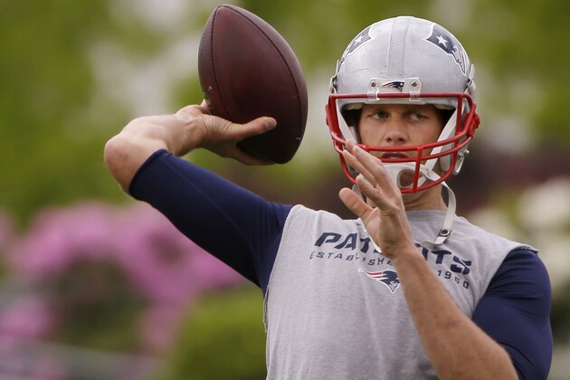 New England Patriots quarterback Tom Brady throws a pass during an NFL football organized team activity, Thursday, June 4, 2015, in Foxborough, Mass. (AP Photo/Stephan Savoia)