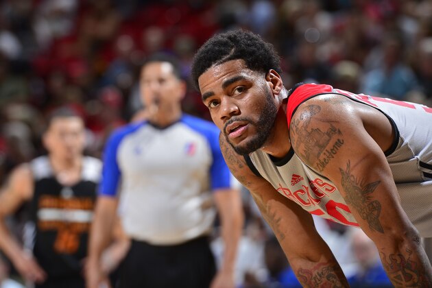 LAS VEGAS, NV - JULY 12:  D.J. Kennedy #50 of the Houston Rockets looks on against the Phoenix Suns during the 2015 NBA Las Vegas Summer League game on July 12, 2015 at the Thomas & Mack Center in Las Vegas, Nevada. NOTE TO USER: User expressly acknowledges and agrees that, by downloading and or using this photograph, User is consenting to the terms and conditions of the Getty Images License Agreement. Mandatory Copyright Notice: Copyright 2015 NBAE  (Photo by David Dow/NBAE via Getty Images)