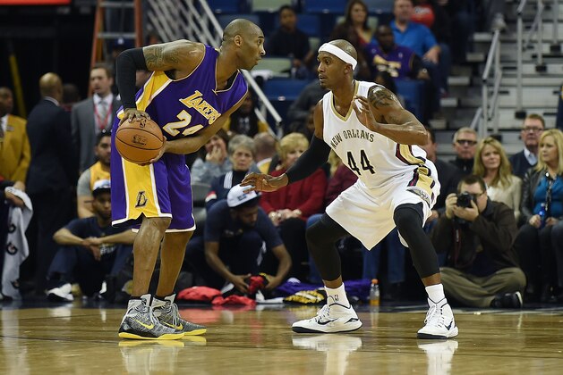 NEW ORLEANS, LA - JANUARY 21:  Kobe Bryant #24 of the Los Angeles Lakers works against Dante Cunningham #44 of the New Orleans Pelicans during a game at the Smoothie King Center on January 21, 2015 in New Orleans, Louisiana. NOTE TO USER: User expressly acknowledges and agrees that, by downloading and or using this photograph, User is consenting to the terms and conditions of the Getty Images License Agreement.  (Photo by Stacy Revere/Getty Images)