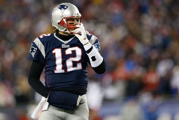 Jan 10, 2015; Foxborough, MA, USA; New England Patriots quarterback Tom Brady (12) during the 2014 AFC Divisional playoff football game against the Baltimore Ravens at Gillette Stadium. Mandatory Credit: Greg M. Cooper-USA TODAY Sports Jan 10, 2015; Foxborough, MA, USA; New England Patriots quarterback Tom Brady (12) during the 2014 AFC Divisional playoff football game against the Baltimore Ravens at Gillette Stadium. Mandatory Credit: Greg M. Cooper-USA TODAY Sports
